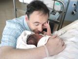 2 days old (Thumbnail 20 k bytes, click through to 483kB file).  Janet caught this cute shot of Jeffrey reaching up to my face.  He's so tiny and sweet!  Perhaps I should hang on to this one to look at when he crashes my car in 17 years time.  Like the previous one, used MS Office Picture Manager to tweak the color balance, as the hospital room had a lot of flourescent light.