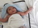 Waving his arms after a bath, he seems to be liking them better! (Thumbnail 26.2 k bytes, click through to 243kB file).  Six weeks old.
